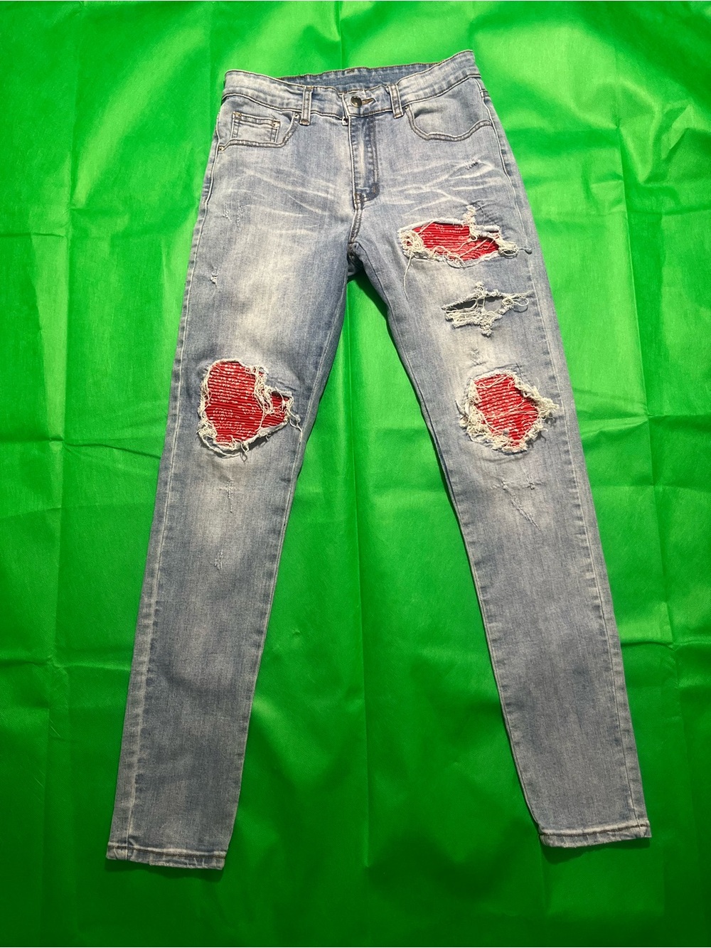 Light Wash Women’s Distressed Jeans with Red Patch Detail
